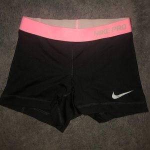Nike pros with pink band